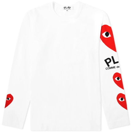 T-shirt femme blanc CDG Play à manches longues avec plusieurs logos cœur rouges.