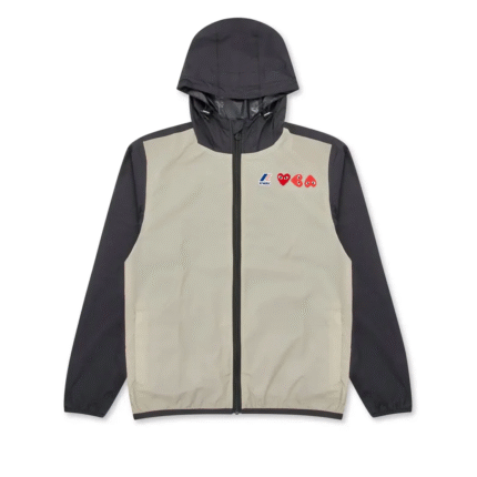 Veste zippée beige et noire CDG x K-Way pour homme avec design imperméable.