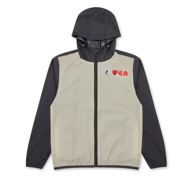 Veste zippée beige et noire CDG x K-Way pour homme avec design imperméable.