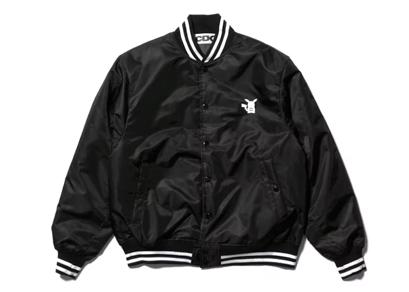Blouson CDG x Pokémon pour homme, design streetwear inspiré de l’univers Pokémon.